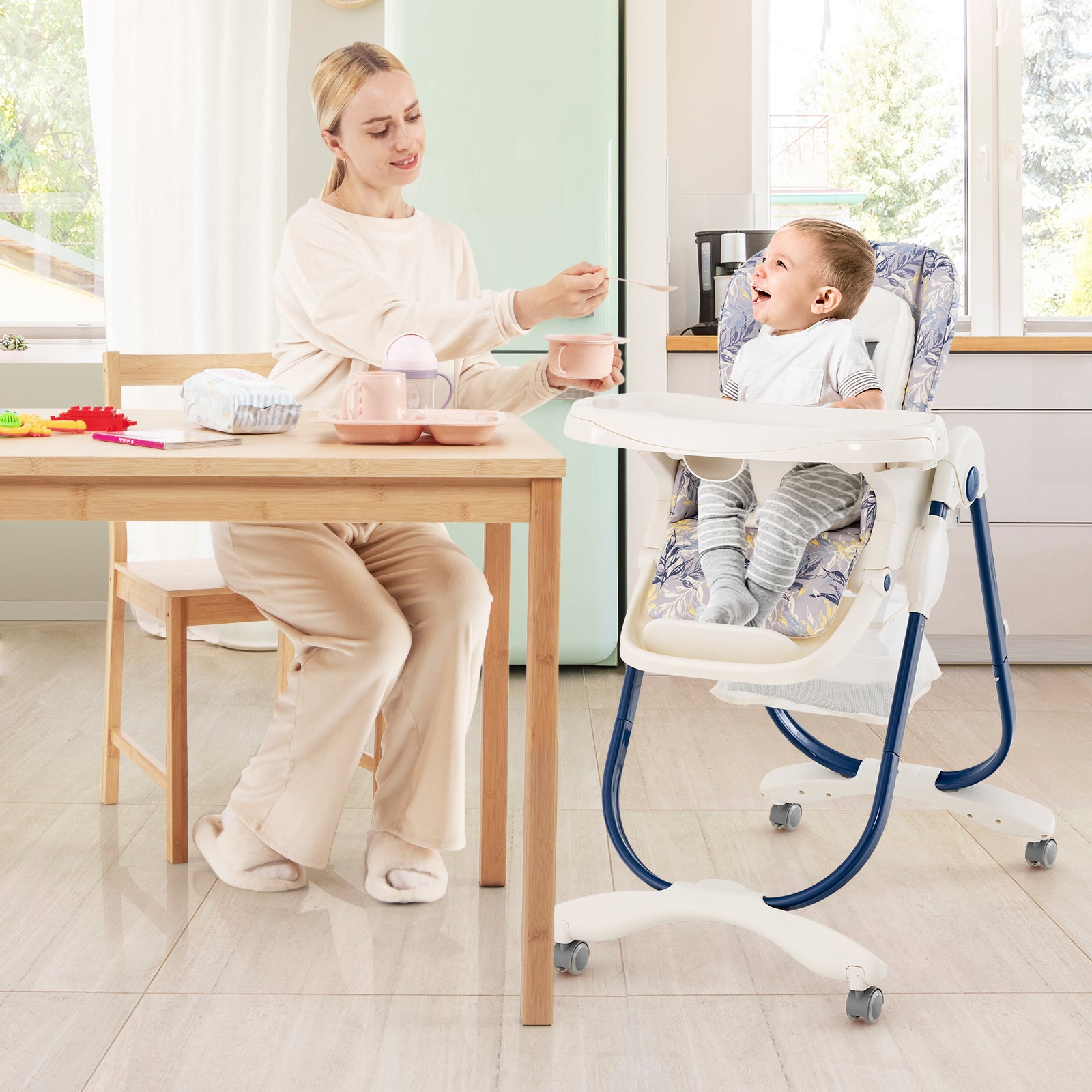 Multifunctional Folding Baby High Chair with Rolling Wheels navy mother feeding baby