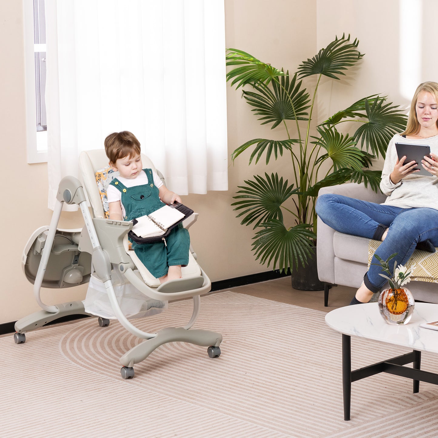 Multifunctional Folding Baby High Chair with Rolling Wheels White baby reading with mum in living room 