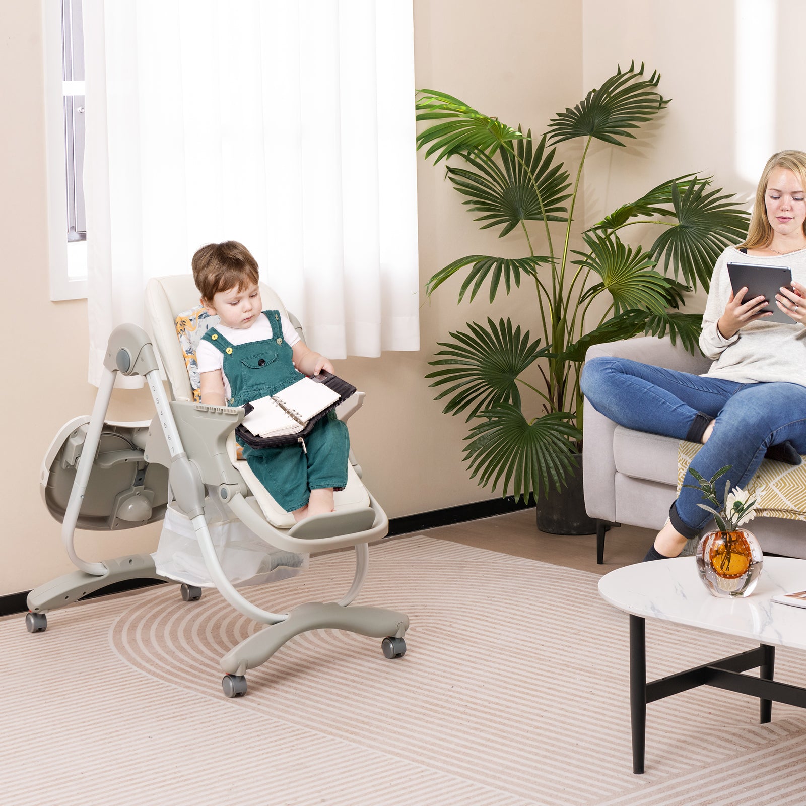 Multifunctional Folding Baby High Chair with Rolling Wheels White baby reading with mum in living room 